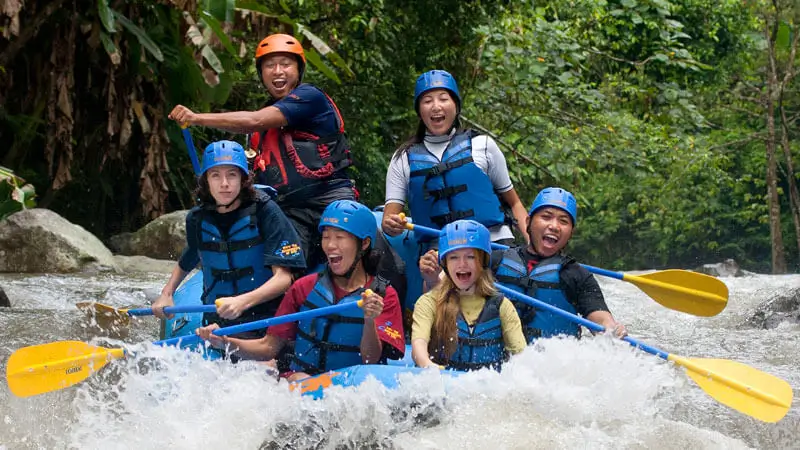 Group of tourists rafting on Ayung River in Ubud, Bali during the dry season.