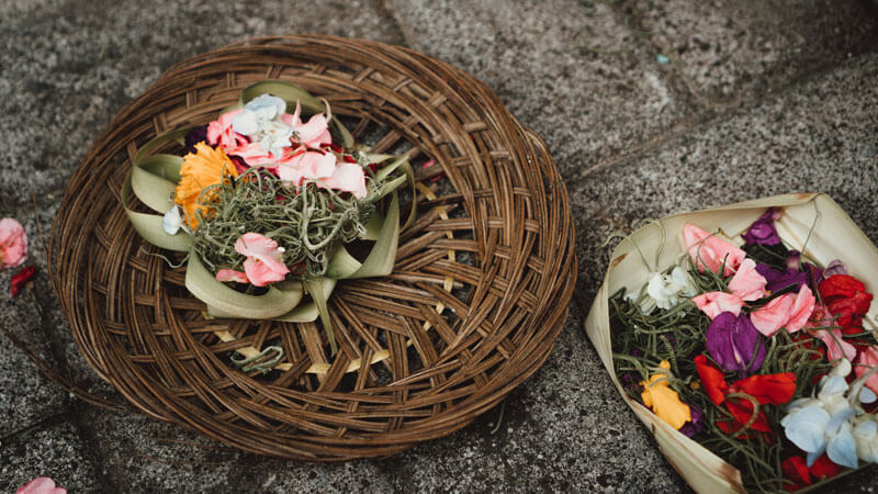 Canang sari offerings on the streets of Bali, Seminyak Travel Guide