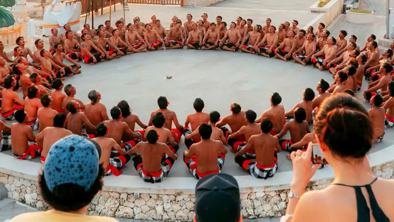 Spectators watch the Kecak Dance at Melasti Beach