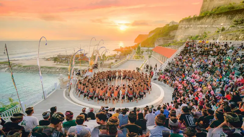 Kecak Dance Performance at sunset with a full audience.