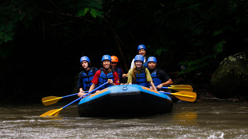 Family-friendly rafting on Ayung River with gentle Class II-III rapids.