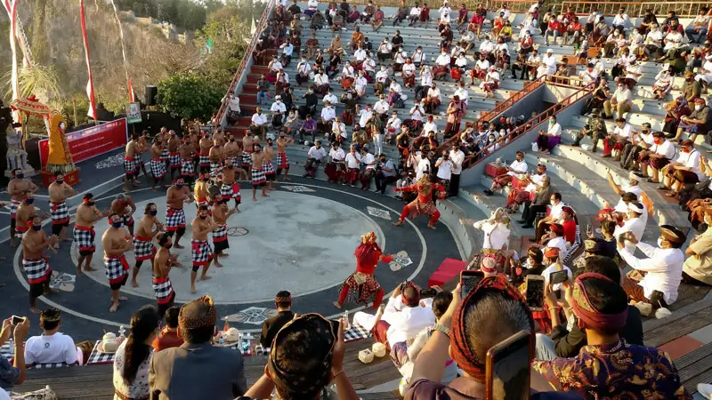 Audience watching the Kecak performance at sunset.