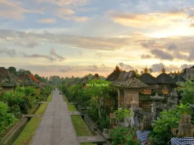 Sunset view of Penglipuran Village Bali, highlighting its traditional architecture and serene atmosphere.